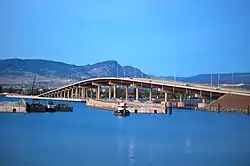 Bridge from West Kelowna, with parts of the original bridge in the foreground