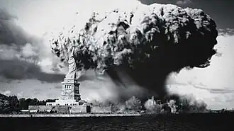 A mushroom cloud emerges over a destroyed city, with the Statue of Liberty in the foreground.