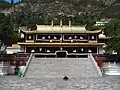 Front view of Gönlung Jampa Ling main temple