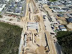 A drone shot of a sandy construction site