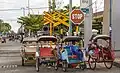 Rickshaws waiting for passengers near the station