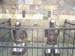 Statues of Lady Wang (秦王氏) and Qin Hui at the Tomb of Yue Fei, Hangzhou