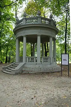 A neoclassical pavilion in a park setting.