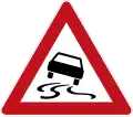 Sign 114 Slipperiness when road is wet or dirty