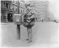 Street types of New York City-Postman at letter box
